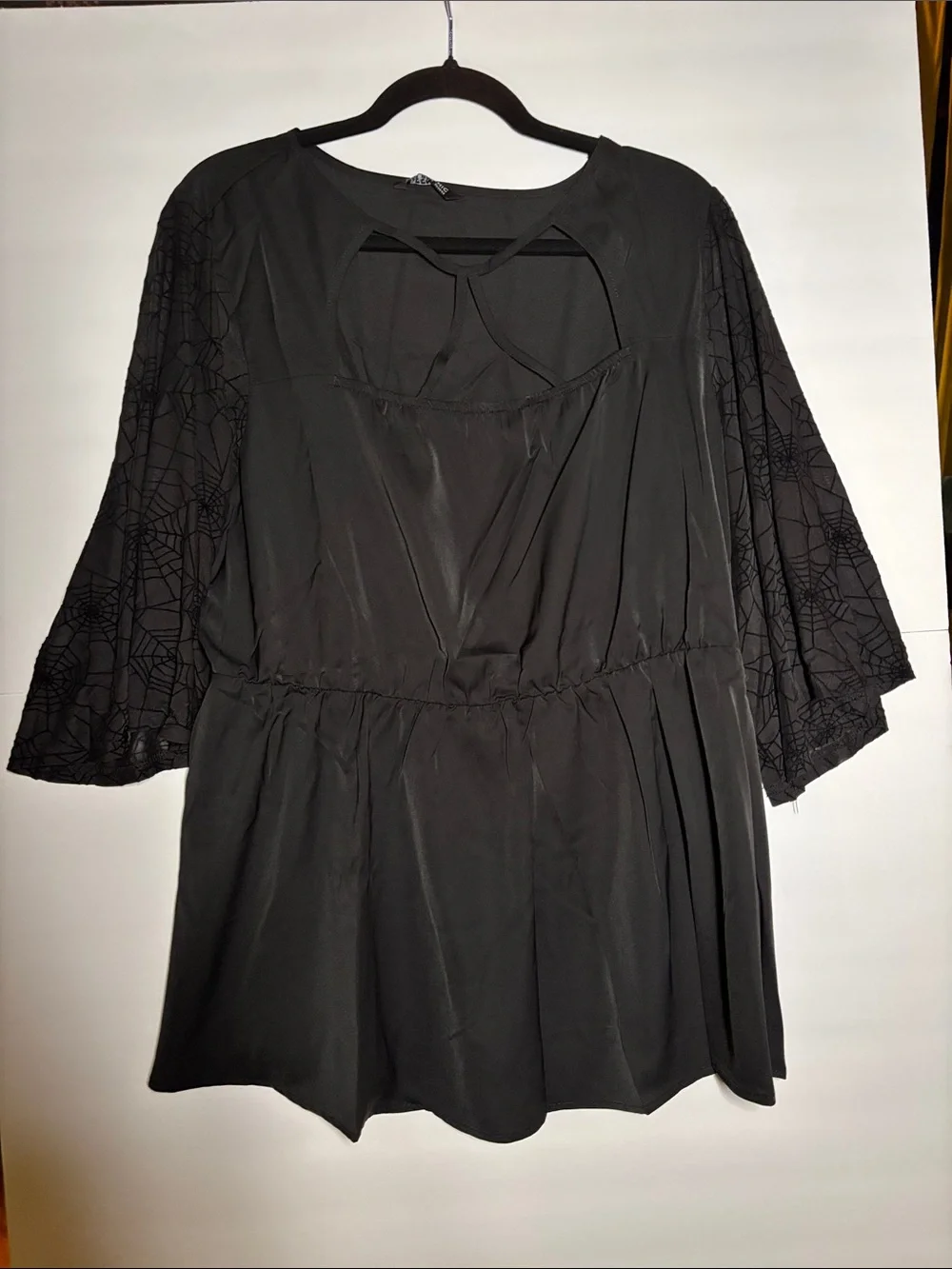 BloomChic Black Peplum Tunic with Lace Sleeves